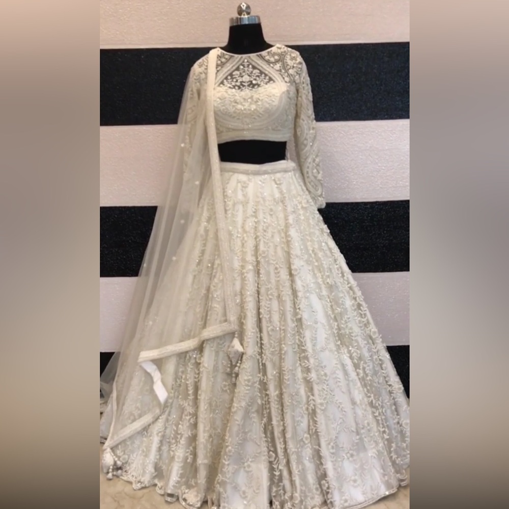 Extravagant Ivory Pearl Lehenga 🤍